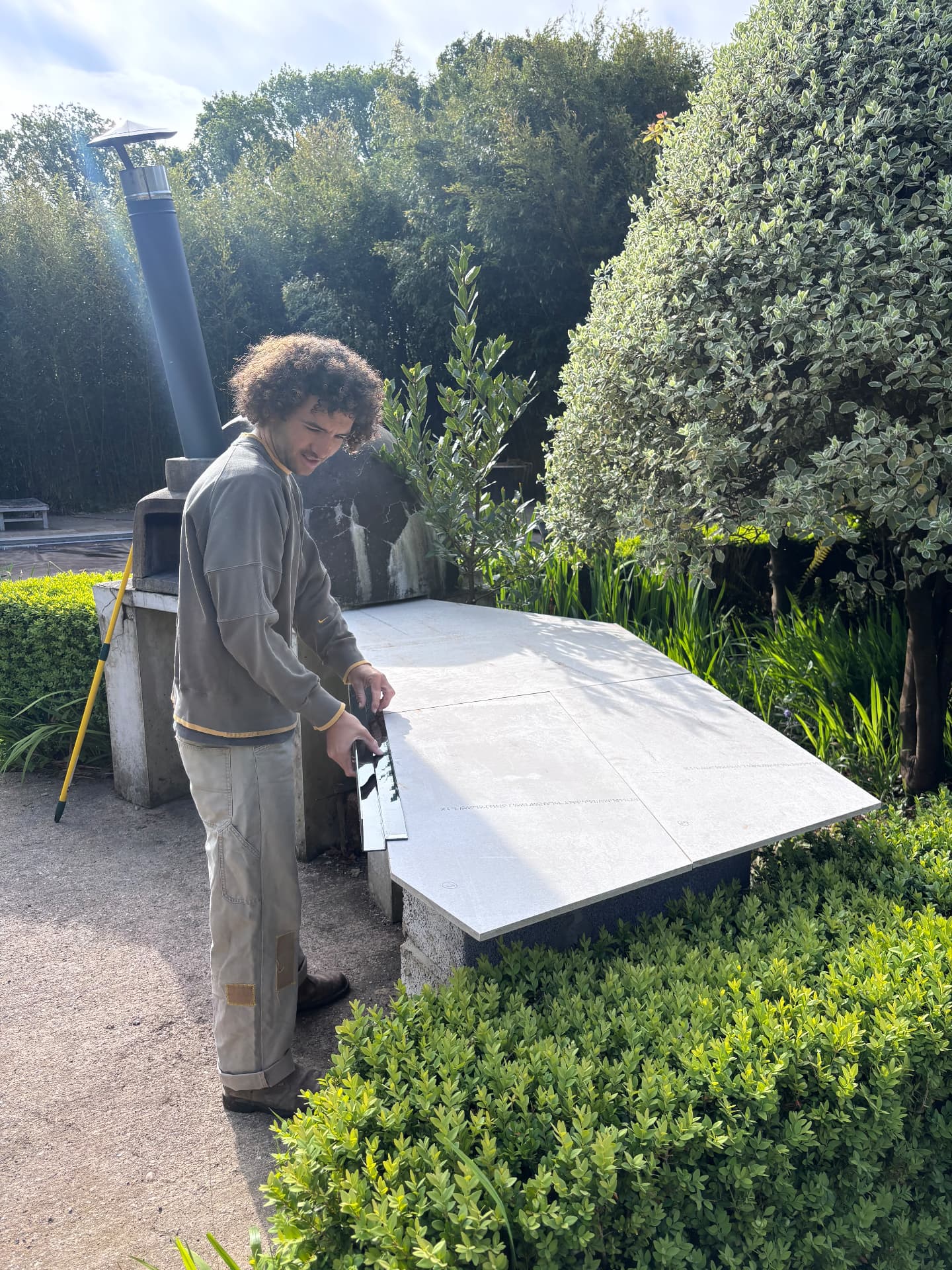 Setting the formwork for the cast concrete worktop beside the oven